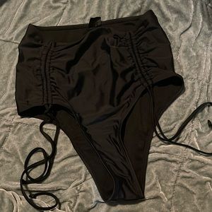 Bikini bottoms- adjustable, high waisted, moderate coverage. Size M